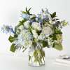 Let this uplifting arrangement be reminders of the clear skies ahead. Capturing