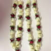 Red and White Rose with baby breath along with pearls 18 in
