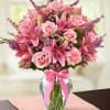 pink flowers in vase, roses. LILIES, carnations wax fillers