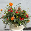 Bring nature&#039;s vibrant hues to life with our Vibrant Sunset Garden Centerpiece