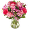 Small arrangement in a clear vase