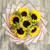 Beautiful Sunflowers with small yellow fillers flowers wrapped in a luxurious Korean