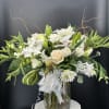 This stunning bouquet features a captivating blend of white  spray roses