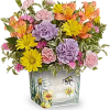 Like a bee dancing through a hidden garden, this enchanting bouquet of