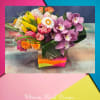 Spring Sorbet is a joyful floral arrangement bursting with color and texture.