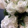 2 Dozen- Standard Bouquet
3 Dozen- Deluxe Bouquet
A grand arrangement of elegant white