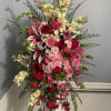 Pink/White Lillies, White Snap Dragons, Ferns, Dark/Light Pink/Red Roses, Lime Green Button