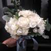 Our hand-tied bouquets and pocket-square combo are the perfect accents for your