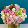 Stunning ceramic vase full of Spray Roses, Peonies, and other mixed flowers