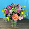 Taller or wider floral arrangement. Upgraded sizing includes more flowers, larger vases