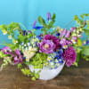 Sympathy flowers can be colorful - to celebrate the life of a