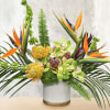 This unique tropical design includes birds of paradise, pin cushion protea, cymbidium
