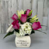 ARRANGEMENT WITH HOT PINK ROSES, HYDRANGEA AND LILIES IN A CERAMIC JEWERLY