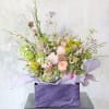 This arrangement creates with fragrant garden rose, Hyacinth, hydrangea, hellebore and seasonal