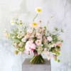A soft blush, peach, sand color way which express a very gentle