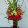 Colorful Elegant Floral with Singapore orchid, bells of Ireland, dahlias, roses and