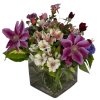 Purple Clematis and Alstroemeria and more flowers adorn this square vase for