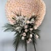 A stunning blush rose heart tribute, delicately designed with soft peach and