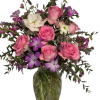 Roses, Carnations, Alstroemeria and more flowers grace this vase for the one