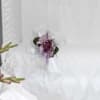 Cross Lid Decoration on white satin pillow with lavender daisy poms, lavender