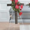 Cross Standing Spray with red anthurium, red roses and lotus pods