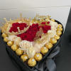Surprise your lovely mom with this beautiful display of chocolates and roses.