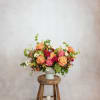 A designers choice arrangement full of lush, premium seasonal blooms. Due to