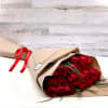 red roses in kraft paper.
