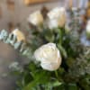 A timeless symbol of purity and elegance, this arrangement features one dozen