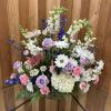 Unique arrangement of purples, pinks and whites.