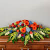 Made to be placed on either an open or closed casket, this