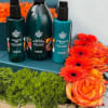 A beautiful display in a wooden crate filled with orange and green