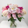 This cute and cheerful bouquet includes light pink roses, hot pink roses