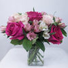 This cute and cheerful bouquet includes light pink roses, hot pink roses