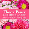 Bright assortment of mixed seasonal flowers in pink tones arranged in a