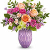 ALL AROUND ARRANGEMENT WITH PEACH ROSES, FUCHSIA CARNATIONS, PEACH MINI CARNATIONS, GREEN