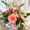 As the name states, pretty arrangement of soft pinks, creams, and greens
