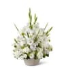 The Warm Reflection arrangement is a peaceful offering of heartfelt sympathy. White
