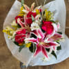 Cheery Stargazer lilies to uplift and brighten someone&#039;s day.

Please note: This arrangement