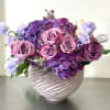 Purple hydrangea with roses and sweet peas 