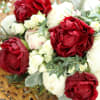 10 Gorgeous Wrapped fresh peonies accented with eucalyptus and greenery - standard.
15
