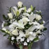 Elegant and timeless, our White Serenity Basket is a beautiful blend of
