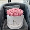 50 light pink roses in our signature large white velvet box will