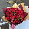 Beautiful fresh-cut red roses and Alstroemerias in a classic bouquet, perfect for