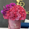 Two kinds of pink roses in a dark pink signature box&mdash;the perfect