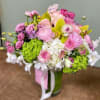 This exquisite arrangement includes hydrangeas, ranunculus, lisianthus, cymbidium orchids, roses and peonies.