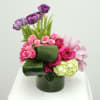 Make their day with this exquisite floral centerpiece. Featuring a carefully selected