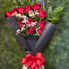 Bring home a dozen of our exclusive premium roses wrapped in our