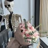A delicate bouquet of white and pink roses, each petal soft and
