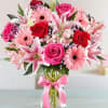 A romance bouquet typically consists of beautiful flowers associated with love and